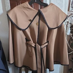 Classic Camel Cape-Style Women's Sweater with Black Trim